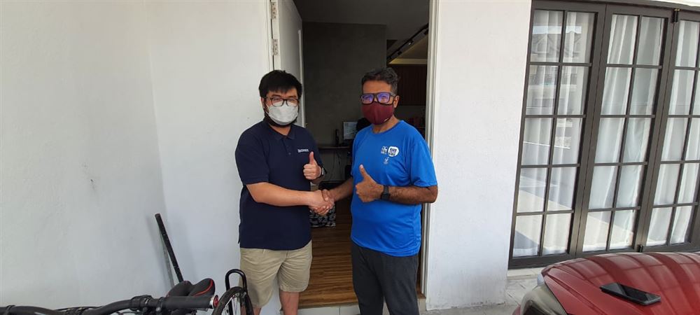 Customers giving thumbs up after DOMOS smart home installation
