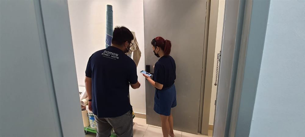 DOMOS installation team at work in a customer's home