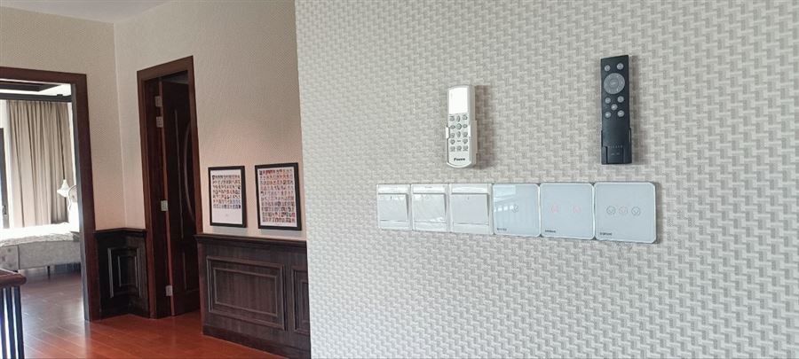 Smart glass switch panels installed in a Malaysian home